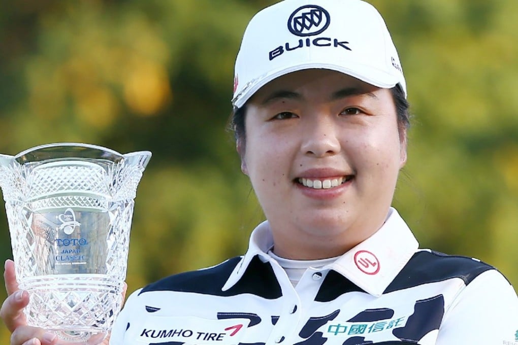 Shanshan Feng of China poses with the trophy after winning the LPGA Japan Classic golf tournament in Omitama. Photo: AFP