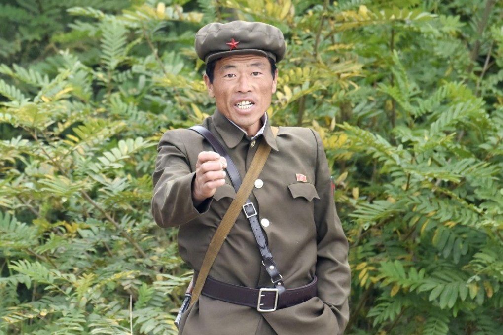 A North Korean soldier on the shore of the Yalu River on the border between China and North Korea. The only way to locate and destroy with complete certainty all components of North Korea’s nuclear weapons programme is through a ground invasion. File photo: Kyodo