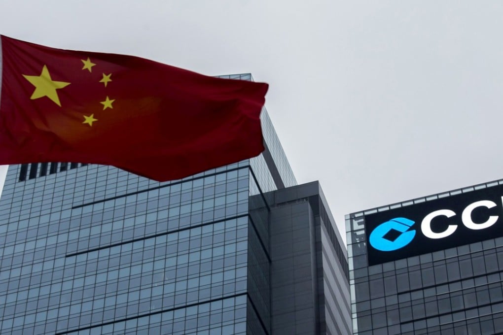 A Chinese national flag flies in front of the China Construction Bank Tower in Hong Kong's Central. Photo: