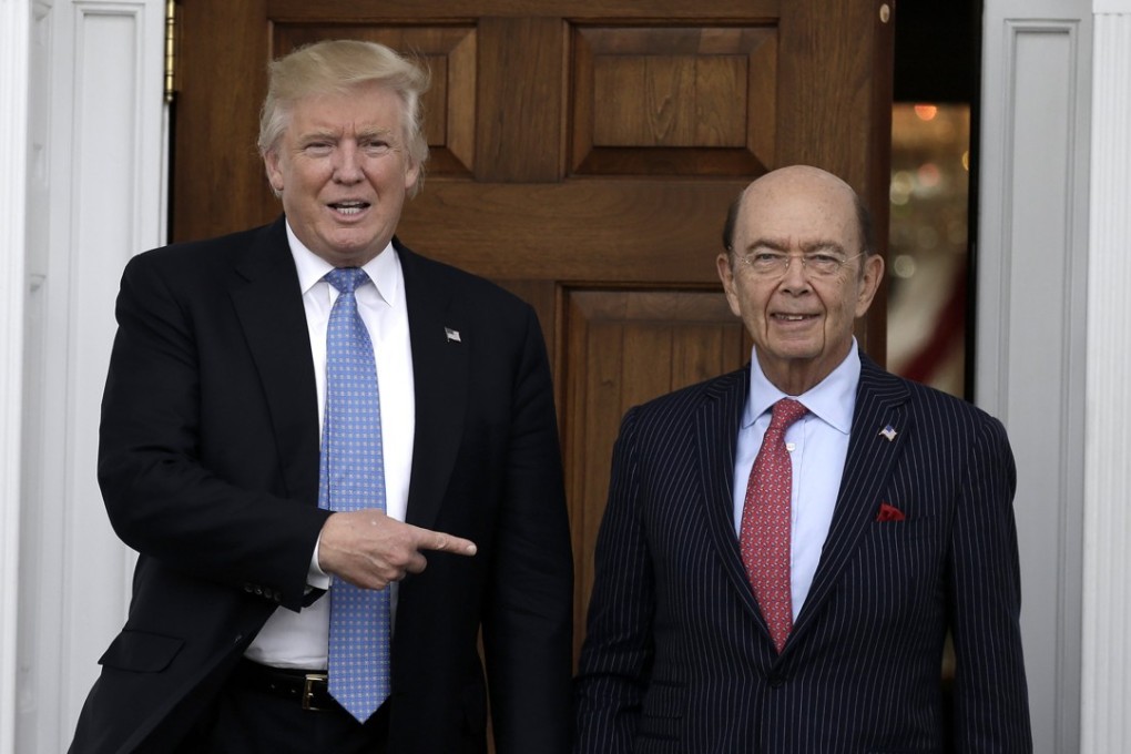 Donald Trump and Wilbur Ross who is now the US president’s commerce chief. File photo: EPA