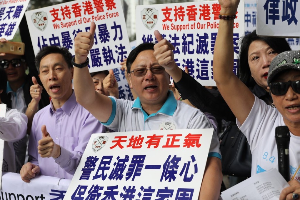 Supporters of retired policeman Frankly Chu make their voices heard outside Eastern Court on Monday. Photo: Handout