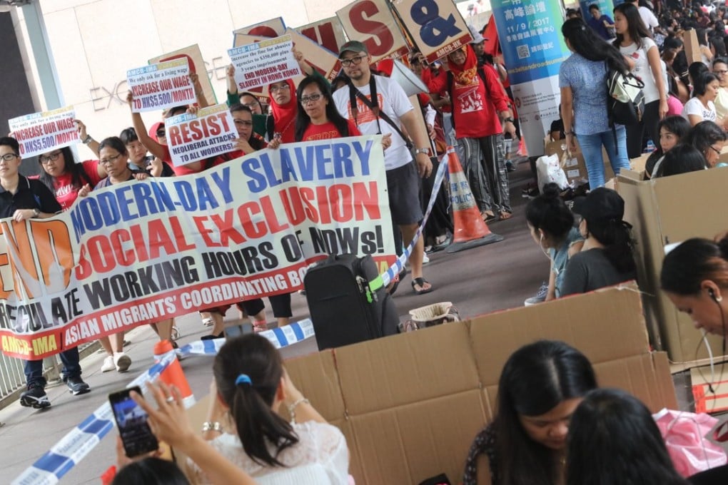 The Asian Migrants' Coordinating Body marches from Exchange Square in Central to the Labour Department to campaign for a wage increase for foreign domestic workers in September. Photo: Felix Wong
