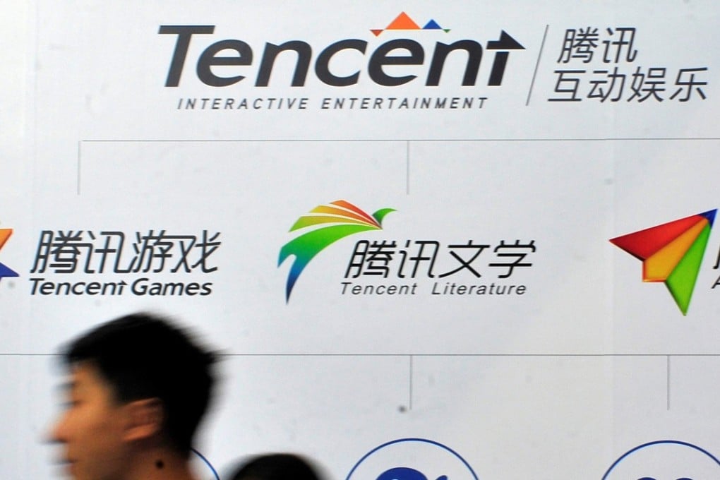 People walk past a logo of Tencent Literature at a Tencent Interactive Entertainment stand during a book fair in Guangzhou in August. Photo: Reuters