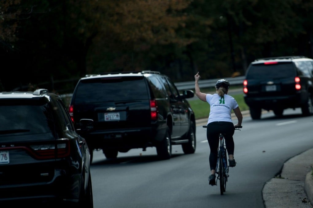 Juli Briskman was cycling in Virginia last month when she offered the gesture in a gut reaction to Trump’s policies, she said. Photo: AFP
