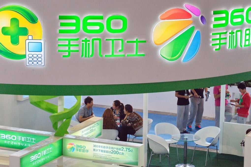 People visit the stand of wan 360.cn of Qihoo during an expo in Beijing on 24 September 2013. Photo: Handout