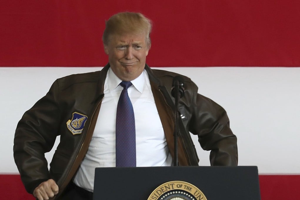 Donald Trump meets US troops at the US Yokota Air Base, on the outskirts of Tokyo, on Sunday. Photo: AP