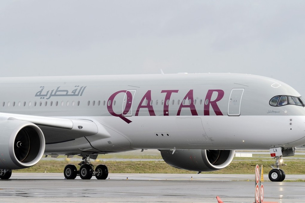 The first Airbus A350 bears the Qatar airline company logo on the tarmac of Toulouse Blagnac airport, southwestern France in 2014. Photo: AFP