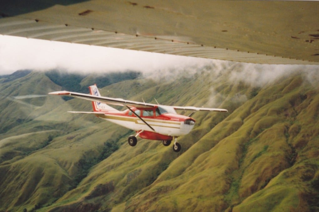 A six-seater Cessna 206 utility aircraft over the Papua New Guinea Highlands. A 6.5 magnitude quake struck the country on Wednesday, November 8, 2017. Photo: Colin Hicks