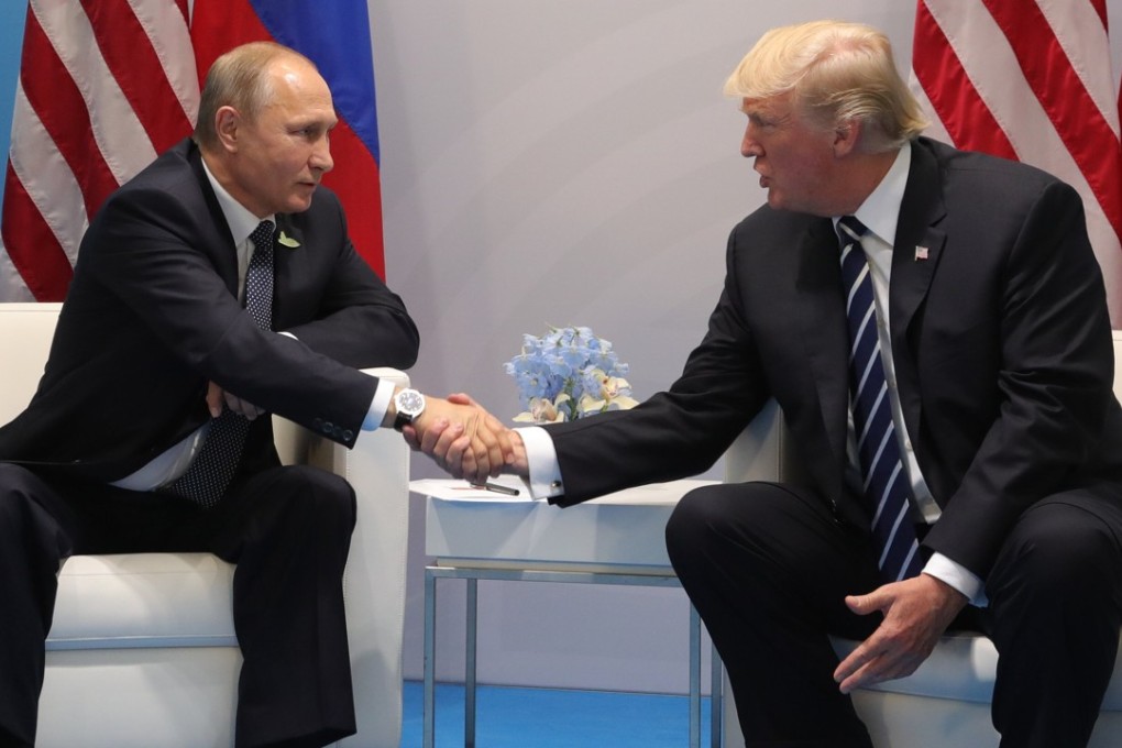 File photo of Russian President Vladimir Putin and US President Donald Trump meeting on the sidelines of the G20 summit in Hamburg, Germany in July 2017. Photo: EPA