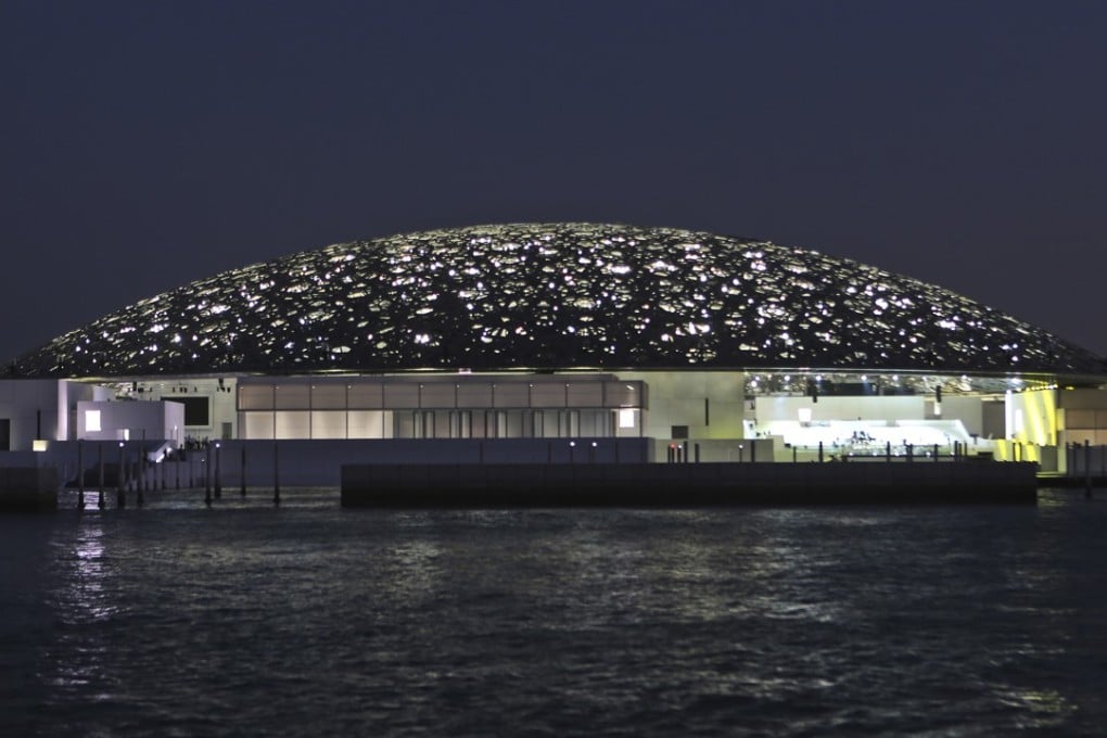 A night view of the Louvre Abu Dhabi, United Arab Emirates. The museum, which opens on Saturday to the public, encompasses work from both the East and West. Photo: AP