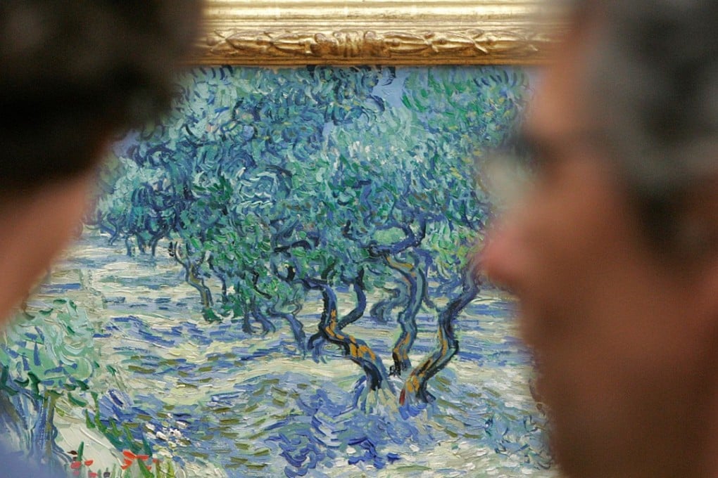 The painting ‘Olive Trees’ by Dutch artist Vincent van Gogh. Conservators at The Nelson-Atkins Museum of Art put this painting under the microscope and found an unlikely intruder: a grasshopper trapped in the canvas's painterly whirls for 128 years. File photo: AFP