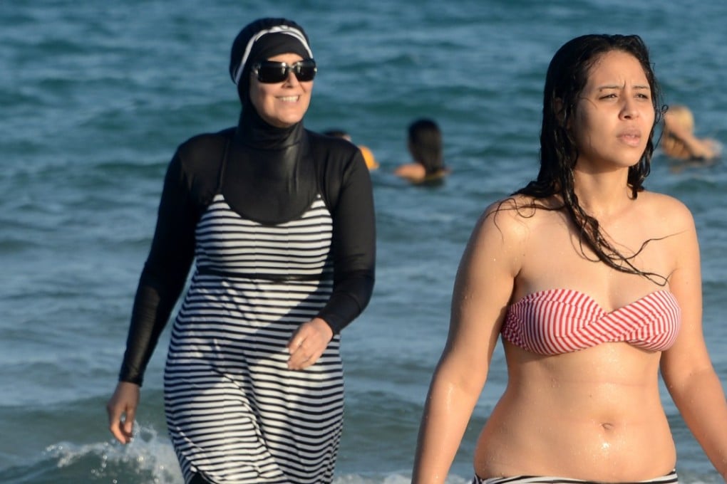 A Tunisian women wears a burkini at Ghar El Melh beach near Bizerte, northeast of the capital Tunis. File photo: AFP