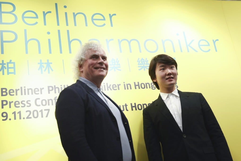 Simon Rattle (left), chief conductor of the Berlin Philharmonic Orchestra, and Korean pianist Cho Seong-jin will perform in Hong Kong on Friday. Photo: Nora Tam