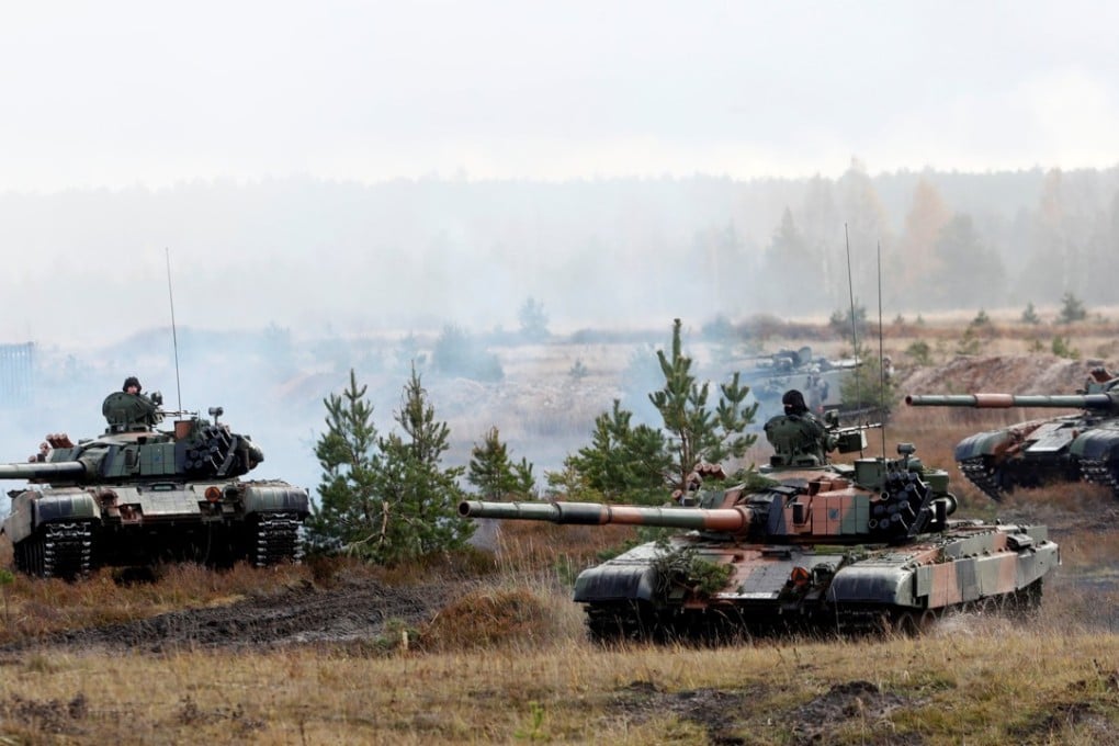 Polish Army PT-91 tanks are seen during Silver Arrow 2017, the multinational military drills involving eleven Nato member countries in Adazi, Latvia. Several EU countries are pulling together in a new defence agreement to jointly manufacture military hardware while Nato boosted its command structures. Photo: Reuters