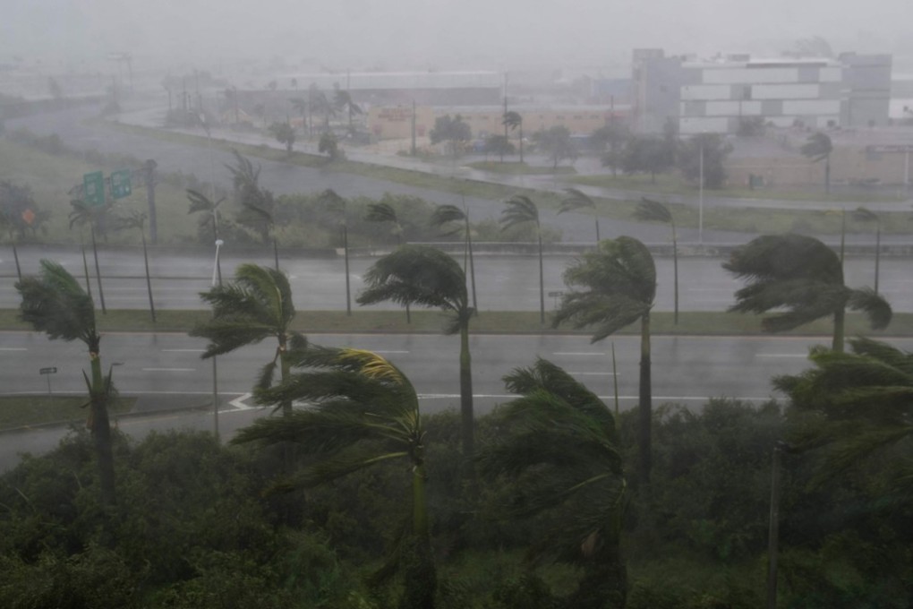 Manulife’s profits took a hit from a series of savage storms in the US including Hurricane Irma, seen here battering Miami, Florida. Photo: AFP