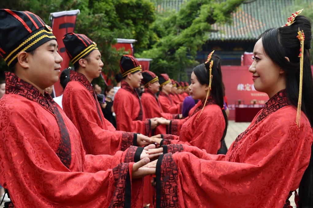 A mass wedding in Shanxi province during Qixi Festival. The younger generation considers the festival a Chinese version of Valentine’s Day, buying gold jewellery as a token of love. Photo: Xinhua