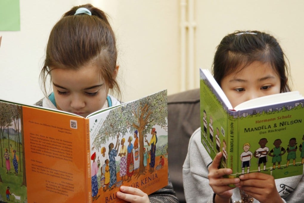 Primary school pupils in Hong Kong learn about life in Africa. Hong Kong has to take heed of the social side of learning as it looks for a more enlightened education system, with less test-driven teaching methods. Photo: Alamy Stock Photo