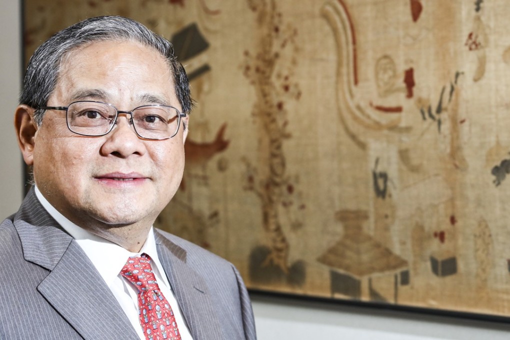 Victor Fung Kwok-king and his family have sold a stake in their Trinity menswear retail unit. Photo: Felix Wong