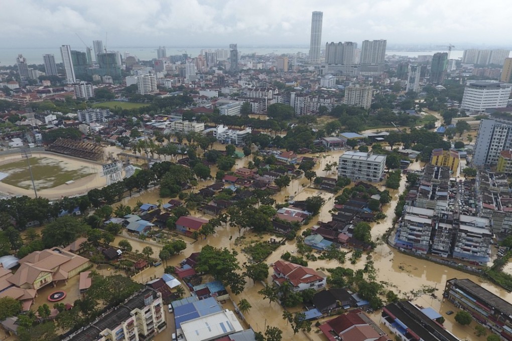 An aerial view of flooded George Town city in the northern Malaysian state of Penang on November 5, after a severe storm led to two deaths and some 2,000 people evacuated. Photo: AP