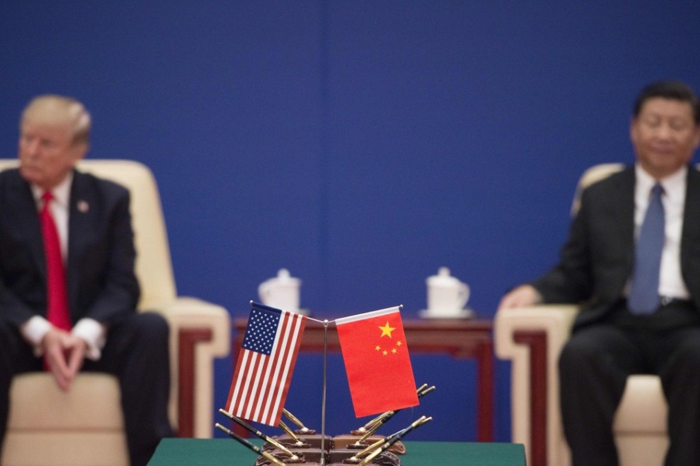 US President Donald Trump (L) and China's President Xi Jinping attend a business leaders event inside the Great Hall of the People in Beijing on November 9, 2017. Photo: Agence France-Presse
