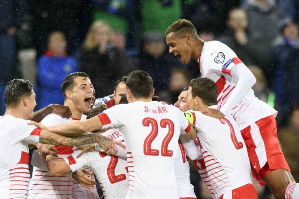 Switzerland players celebrate their 1-0 win over Northern Ireland. Photo: EPA