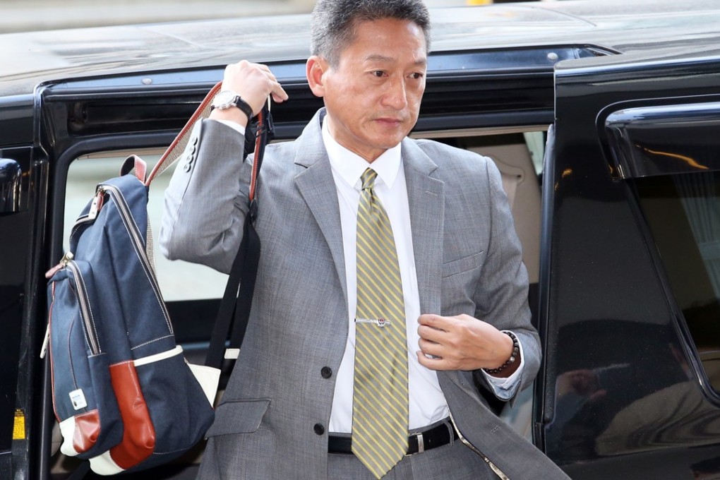 Frankly Chu arrives at Eastern Court in Sai Wan Ho. Photo: David Wong