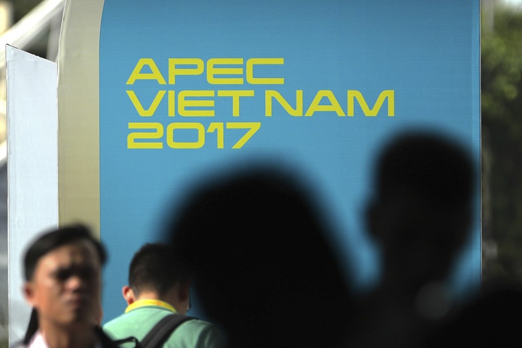 Visitors wait to go through a security check at the media centre for Asia-Pacific Economic Cooperation (Apec) leaders summit in Danang, Vietnam. Photo: AP