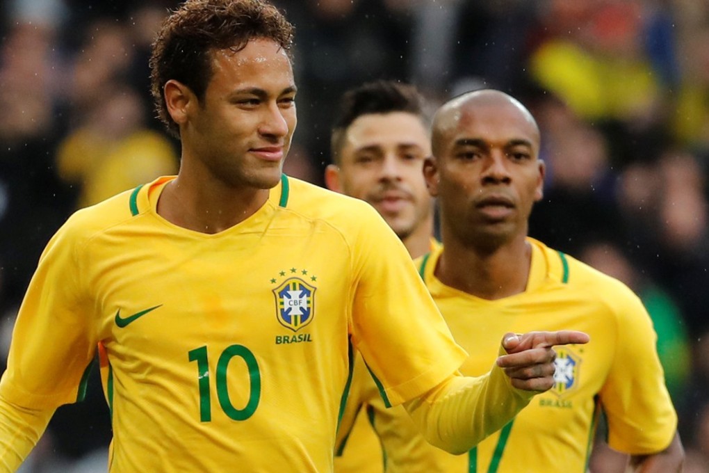 Neymar celebrates after scoring Brazil’s first goal in their 3-1 win over Japan in Lille. Photo: Reuters
