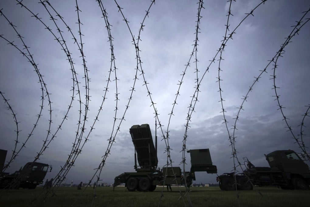 Japanese Air Self-Defence Force shows the training to utilise the PAC-3 surface to air interceptors at the US Yokota Air Base in Fussa. Japan is studying deploying a new land-based Aegis missile defence system. Photo: AP