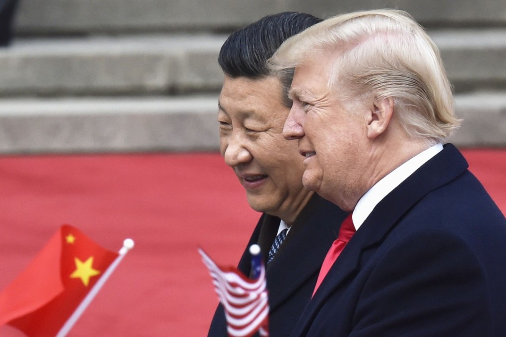 US President Donald Trump and Chinese President Xi Jinping attend a welcome ceremony for Trump at the Great Hall of the People in Beijing. Photo: Kyodo