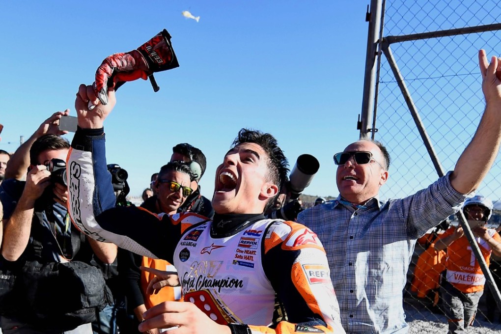 Spanish rider Marc Marquez celebrates after the MotoGP race of the Valencia Grand Prix. Photo: AFP