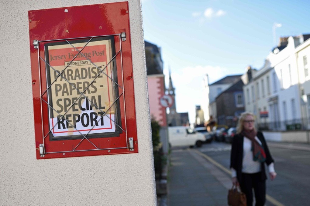 A billboard for The Jersey Post newspaper advertises a special news report on the 'Paradise Papers' in St Helier, on the British island of Jersey, on November 8, 2017. Photo: AFP