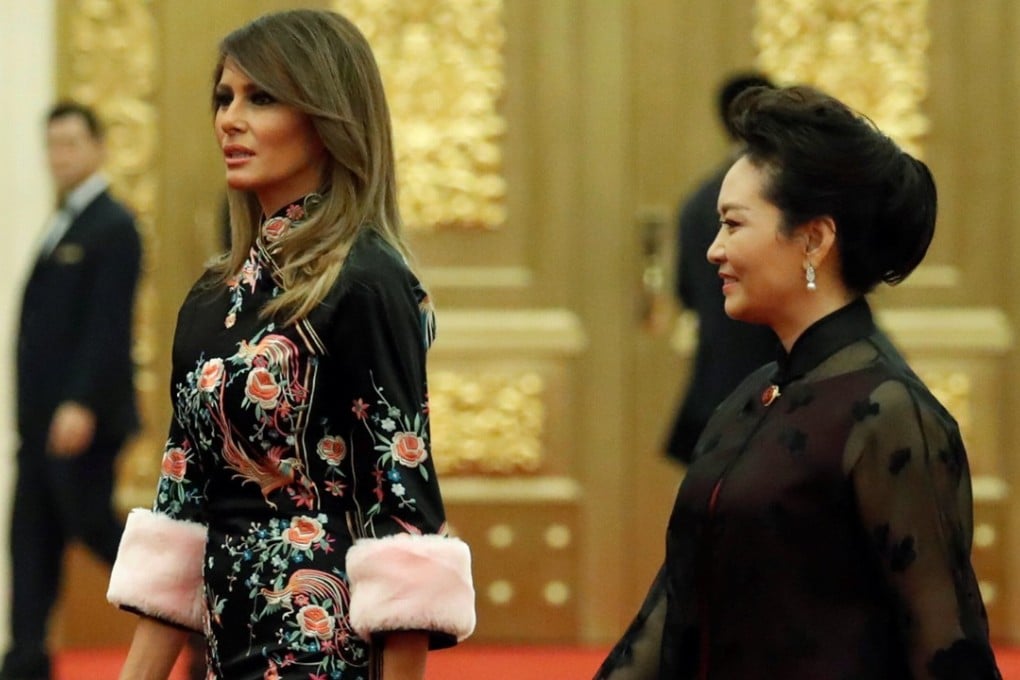 Melania Trump, wife of the US president, and Peng Liyuan, wife of China’s president, arrive for a state dinner at the Great Hall of the People in Beijing on Thursday. Photo: Reuters