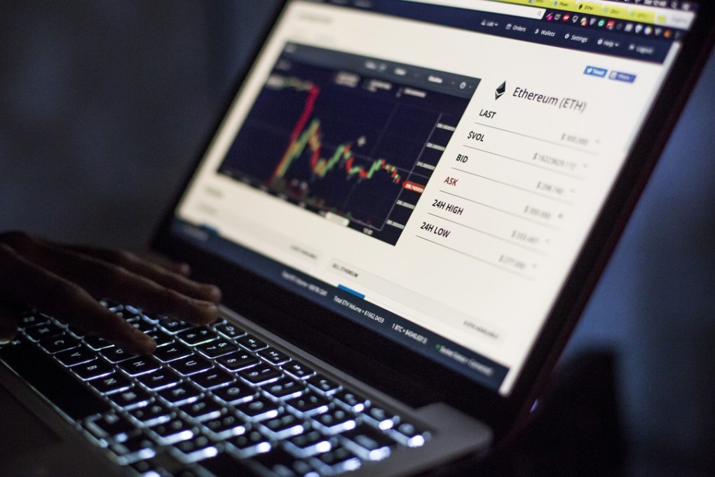 Eugene Mutai, bitcoin 'miner' and software developer, uses a laptop computer to view a web based trading screen for Ethereum (ETH) cryptocurrency in Nairobi, Kenya. Photo: Bloomberg