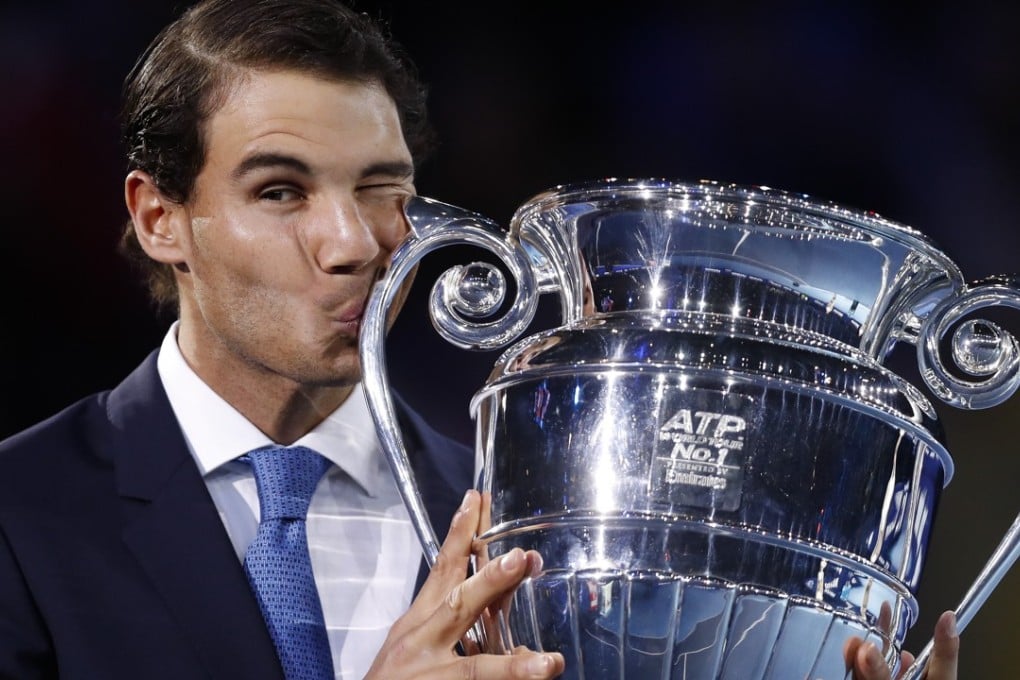 Rafael Nadal of kisses the ATP World Tour year-end No 1 Trophy at the O2 Arena. Photo: Xinhua