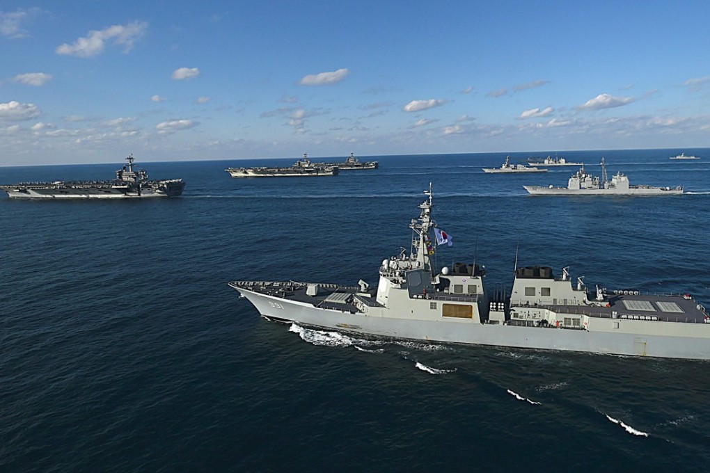 USS Nimitz, USS Ronald Reagan and USS Theodore Roosevelt. Photo: AFP