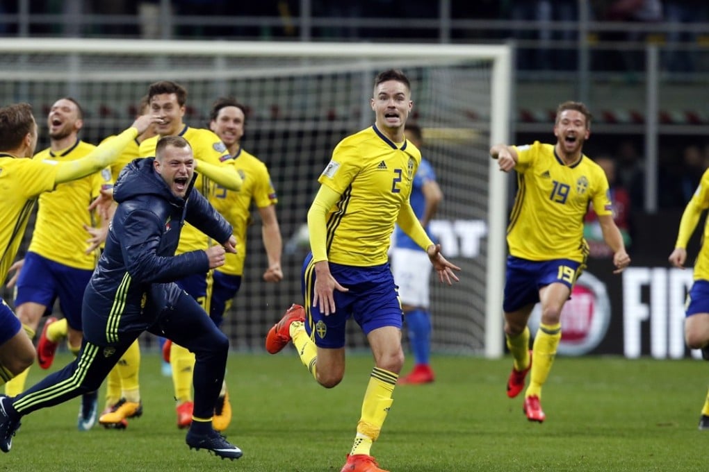 Sweden players celebrate at the end of the World Cup qualifying play-off second leg match after they knocked the Italians out of the World Cup. Photo: AP