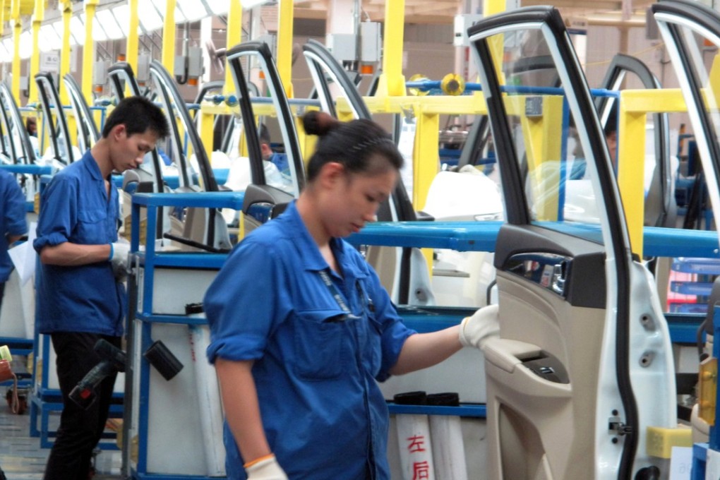 A production line inside a factory of SAIC-GM-Wuling, in Liuzhou, China. Photo: Reuters
