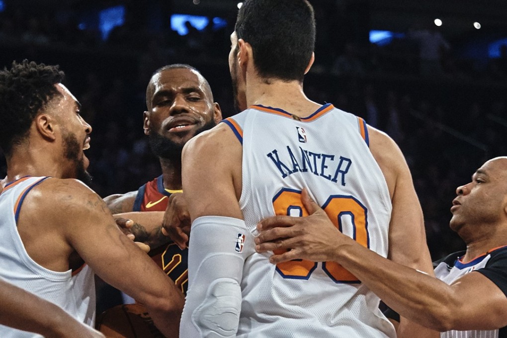 LeBron James (centre) gets involved in a physical altercation with the New York Knicks’ Enes Kanter. Photo: AP