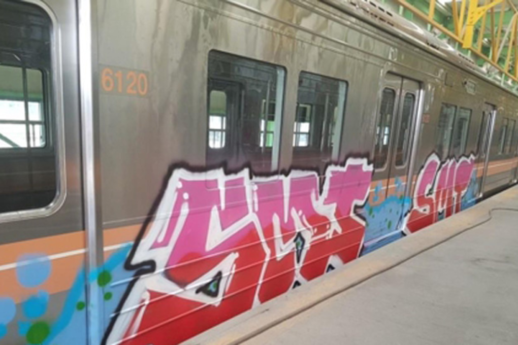 A vandalised Seoul train with graffiti. Photo: Yonhap