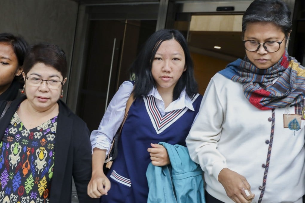Former domestic helper Erwiana Sulistyaningsih (centre) appears at the High Court in Admiralty. Photo: Sam Tsang
