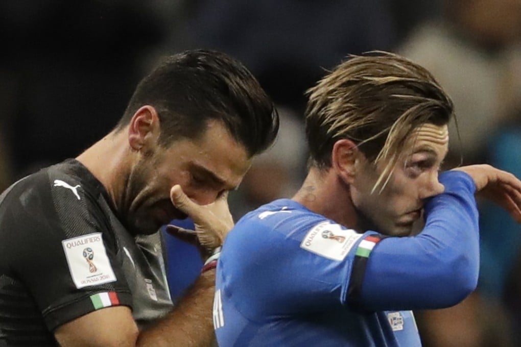 Italy’s legendary goalkeeper Gianluigi Buffon (left) was in tears after Italy’s play-off elimination and announced his retirement from international football. Photo: AP