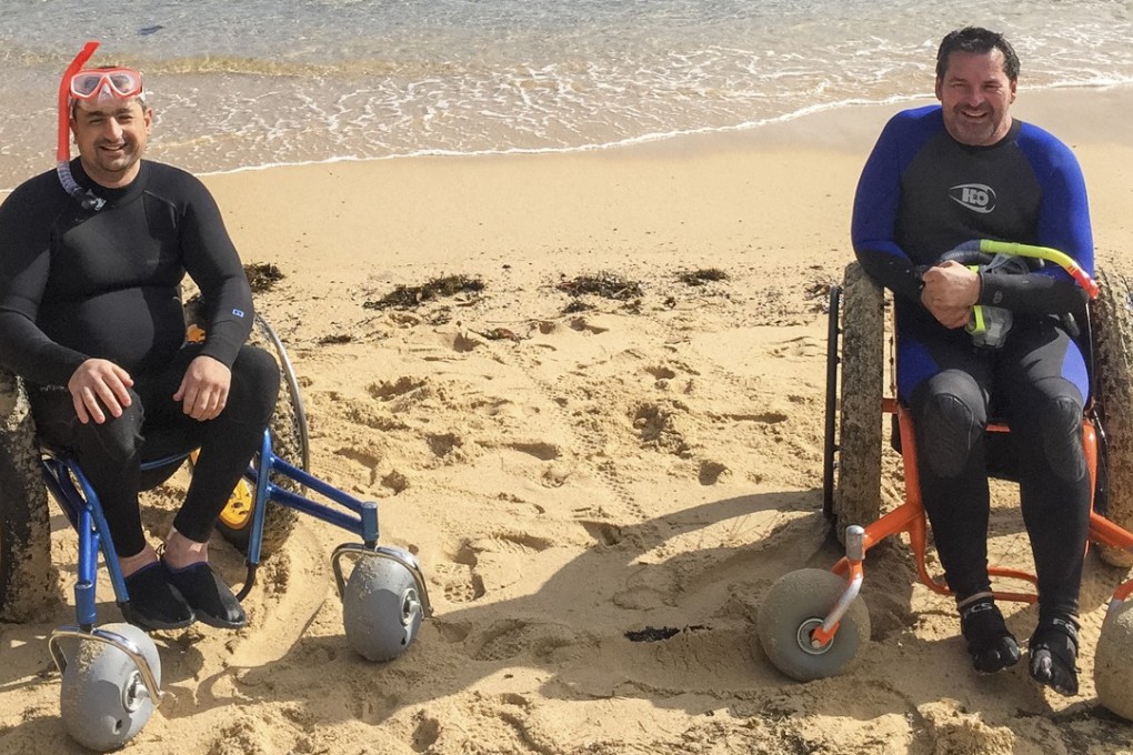 Guests at Sargood in Sydney, Australia, use sand wheelchairs on the private beach before going for a scuba dive at the resort. Photo: WMK: Architecture