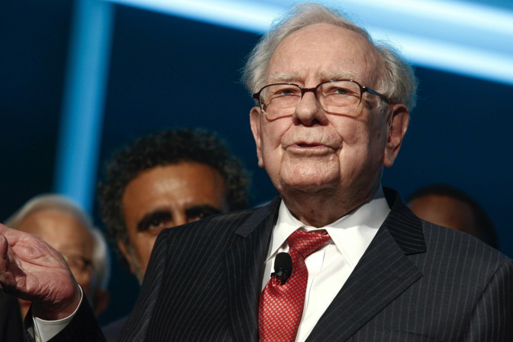 Warren Buffett attends the Forbes 100th Anniversary Gala at Pier Sixty in New York. The billionaire trimmed his holdings in IBM while increasing his stake in Apple. Photo: Invision/AP