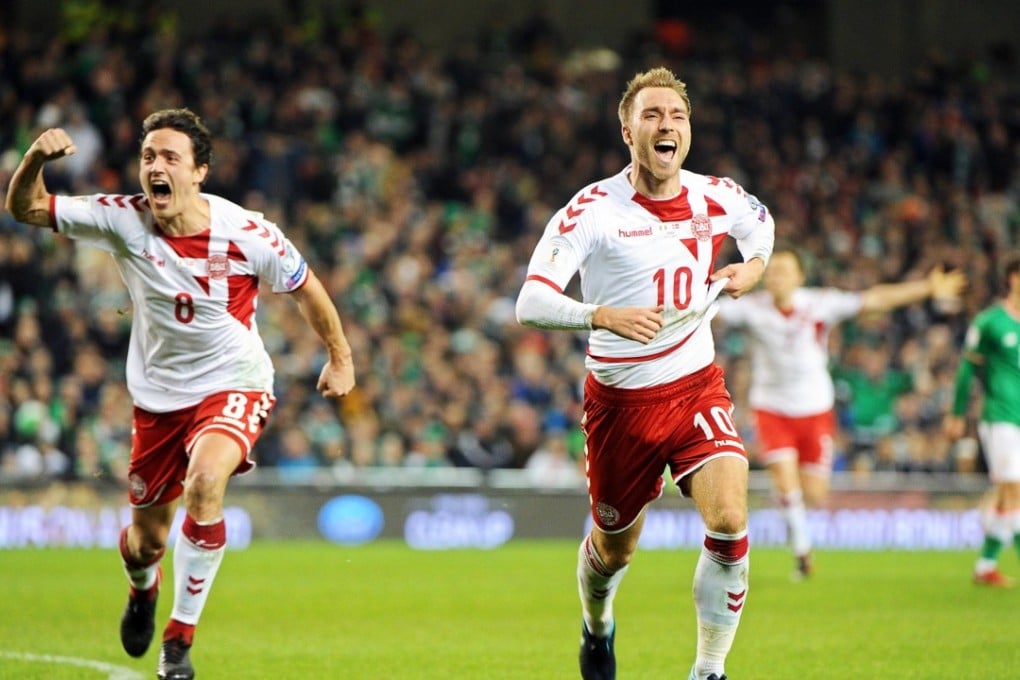 Christian Eriksen (right) celebrates after against Ireland. Photo: EPA