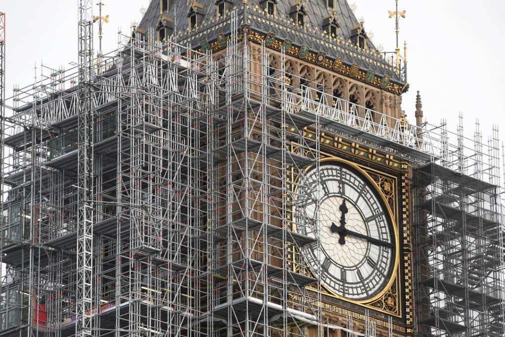 The Elizabeth Tower, housing the Big Ben bell, is seen clad in scaffolding, over the Houses of Parliament, in central London. Some British lawmakers took issue with the government’s plans to quit the EU at 11:00pm on March 29, 2019. Photo: Reuters