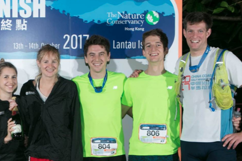 Charlie Landale (right), pictured at the finish line of the Moontrekker in October, will be taking on the Oxfam Trailwalker with colleagues from Jardines. Photo: Barclays Moontrekker