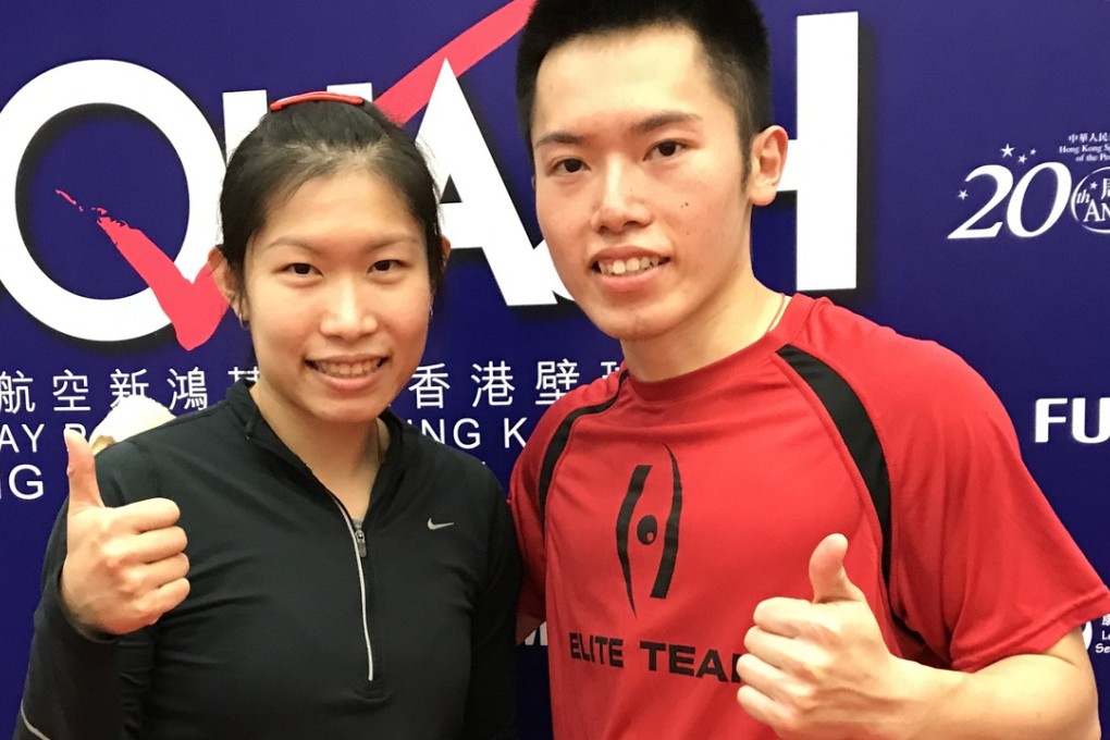 Annie Au and Leo Au give the thumbs up at the Hong Kong Squash Open on Wednesday night. Photo: Chan Kin-wa