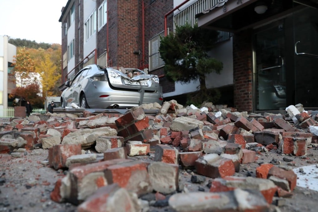 Debris from a nearby building lies on a street in Pohang, North Gyeongsang Province, South Korea. Photo: EPA