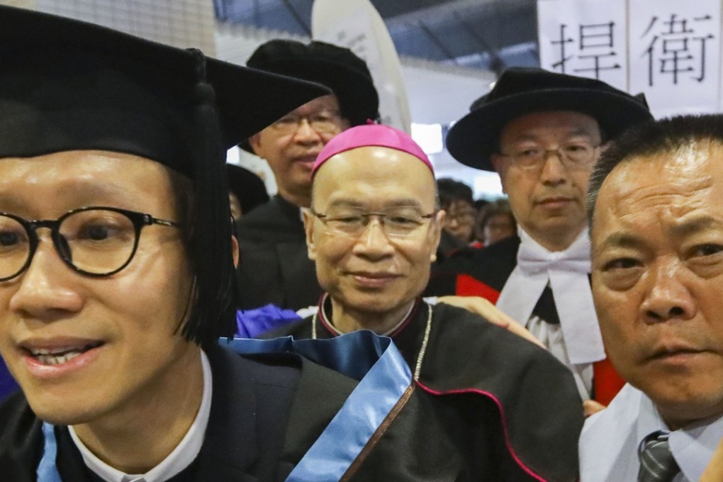 Clashes broke out when Bishop Michael Yeung tried to leave the graduation ceremony at Caritas Institute of Higher Education. Photo: Sam Tsang